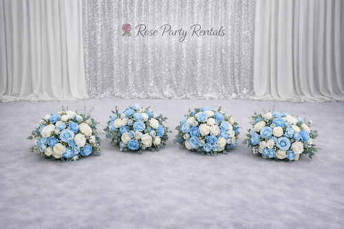 Blue and white rose arrangements on silver sequin