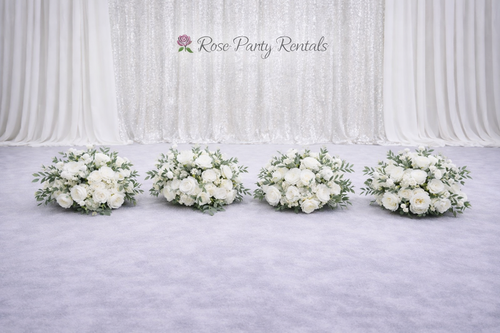 White rose arrangements on silver sequin