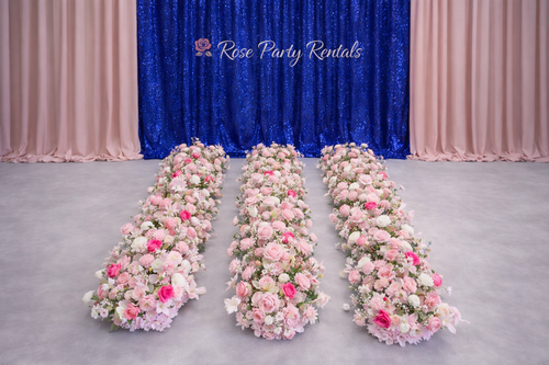 Pink rose runners on blue sequin backdrop